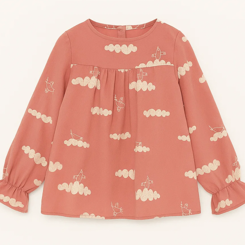 Różowa bluzka w ptaki